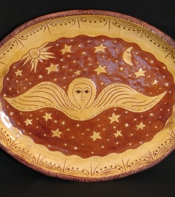 Angel with Moon and Sun redware platter, Kulina Folk Art