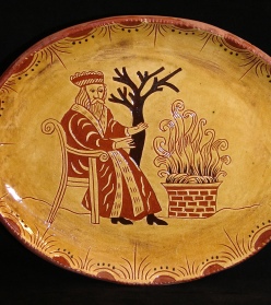 Father Christmas by the fire redware oval platter, Kulina Folk Art