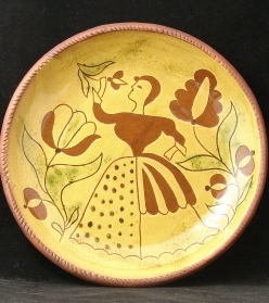 Lady with Tulip redware plate, Kulina Folk Art