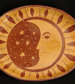 Man in the Moon redware oval platter, Kulina Folk Art