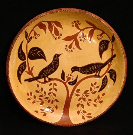 redware charger, black birds and leaves