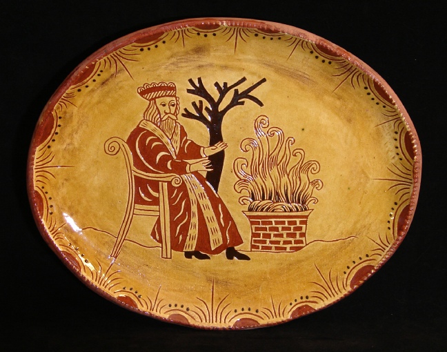 redware oval platter, father christmas by the fire