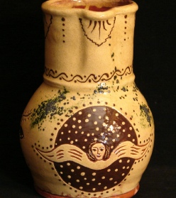 redware pitcher angel with wings