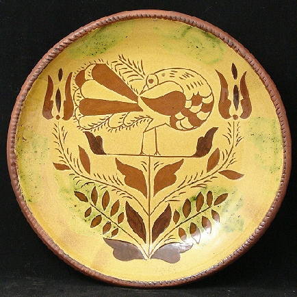 redware plate, peacock with leaves