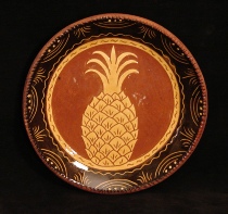 redware plate, pineapple with border