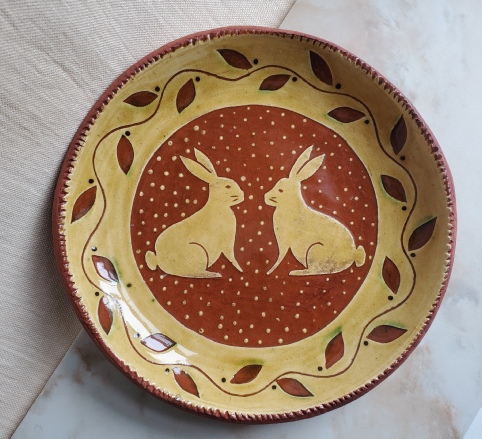 redware plate, rabbits and leaves