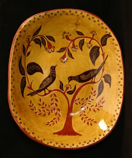 redware trencher, black birds and leaves