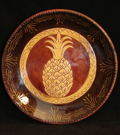 Pineapple with black border redware plate, Kulina Folk Art