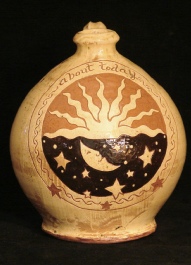 sgraffito redware sun and moon jug