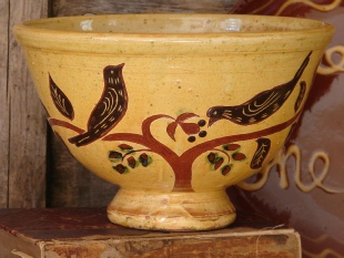 redware fruit bowl, birds eating berries