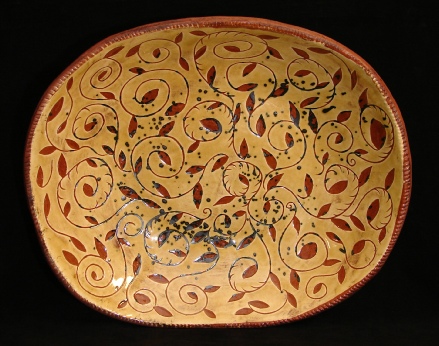 redware charger, ivy leaves