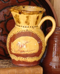 pitcher, sleeping cat