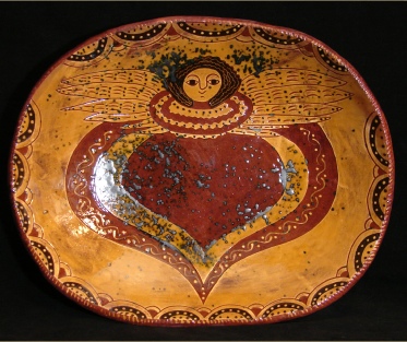 redware trencher, angel with wings