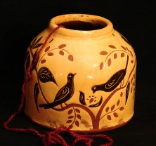 redware yarn holder, black birds eating berries