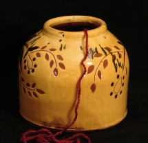 redware yaarn holder, black birds eating berries